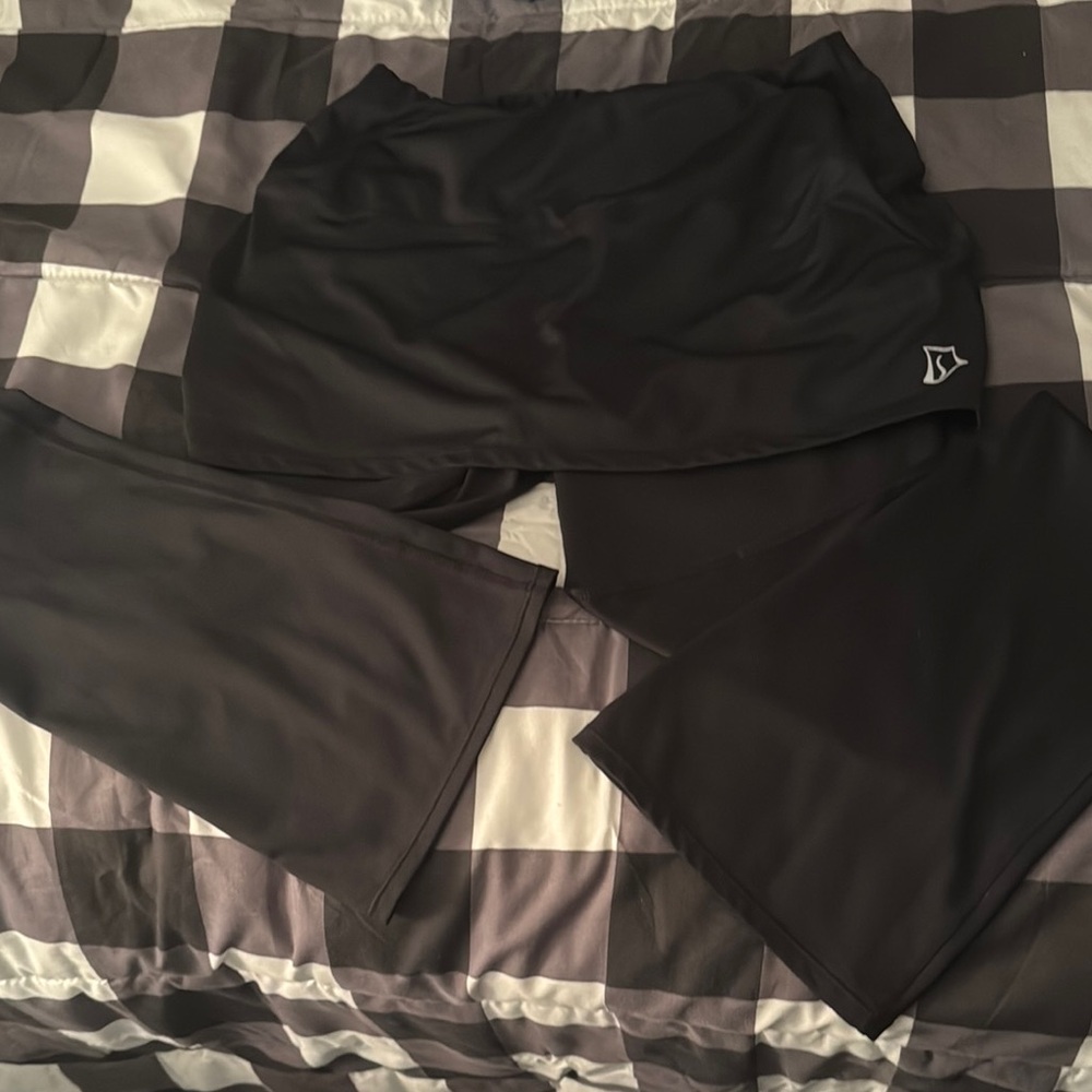 Athletic black Skirt with attached flared leggings.